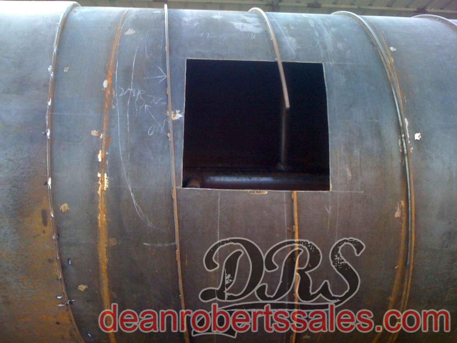 CUSTOM SPECIALTY SEALCOAT TANKS TRUCKS AND HELICAL MIXERS BY DEAN ROBERTS SALES.