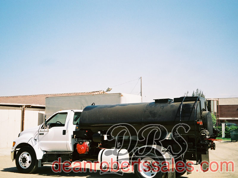 CUSTOM TRUCK MOUNTED SEALCOAT TANKS TRUCKS AND MIXERS.